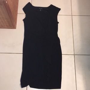 Black party dress. Scrunched in the middle.